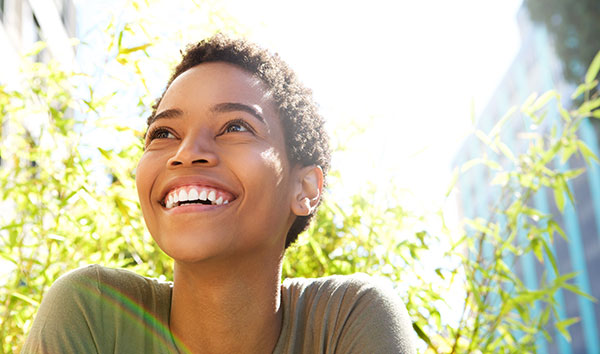 smiling woman looking up